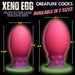 The "Xeno Egg Glow In The Dark Extra Large Thick Silicone Egg" is a vibrant, silicone sex toy with a ribbed design and neon hues that glows in the dark, evoking an alien egg. Measurements and eye-catching colors are clearly displayed.