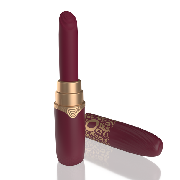 The My Secret Screaming O Premium Lipstick Vibrator, featuring a burgundy body and a gold-patterned cap, stands upright with its cap beside it on a white surface, offering a discreet and stylish design.