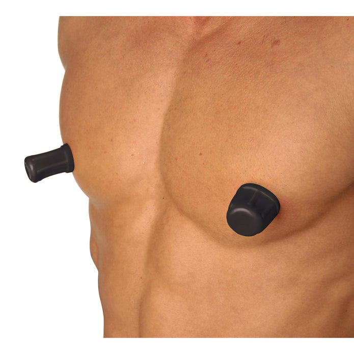 A shirtless person’s muscular torso displays two black Viper Super Suction Nipple Suckers attached for nipple stimulation. Their smooth skin contrasts with the plain white background.