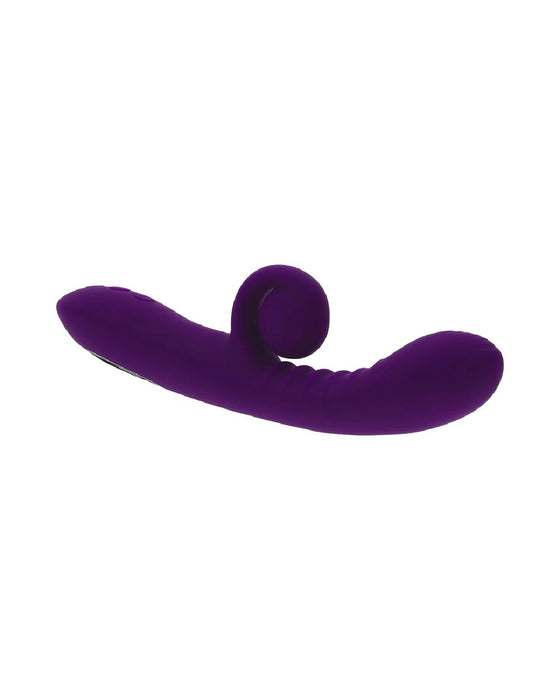 Playboy Curlicue Rabbit Vibrator for Blended Orgasms- Rabbit laying on its back to display the ribbed internal g spot shaft and clit stimulator