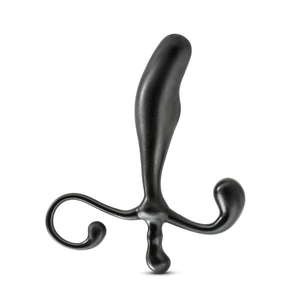 The Anal Adventures Prostate Stimulator - Black by Blush is a striking, abstract sculpture designed with a smooth, elongated body and three curved extensions at the base. This minimalist piece resembles an artistic interpretation of a figure with outstretched arms and a raised leg. Made from premium silicone, it exudes both elegance and durability.