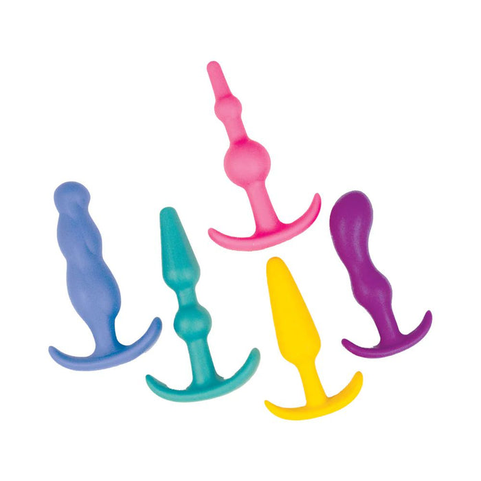 Five silicone anal plugs in a range of shapes and sizes from the Nasstoys Anal Lovers Kit 5-Piece Beginner Butt Plug Set - Multi Color are displayed on a white background. The vibrant colors include blue, pink, teal, yellow, and purple. Each plug features a flared base for added safety, making this kit ideal for beginners.