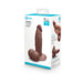 A product box for the b-Vibe Slipskin Realistic 6 Inch Girthy Dark Tone Silicone Dildo displays images and features of a thick, lifelike brown silicone dildo with testicles on the front and sides of the packaging.