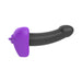 The Bananapants Kissi Dildo Base with Lips and Tongue is a black and purple silicone sex toy, penis-shaped with a textured base for extra stimulation, body-safe, strap-on harness compatible, shown against a white background.