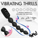 A black Bang! Silicone Vibrating Anal Beads with Digital Display, from XR Brands, is shown featuring beaded graduated sizes and an LED display labeled "Mode" and "3." Text on the image reads "Vibrating Thrills" and describes "7 vibrating patterns to stimulate that back door" with "3 speeds." Icons and visual effects further highlight its features.