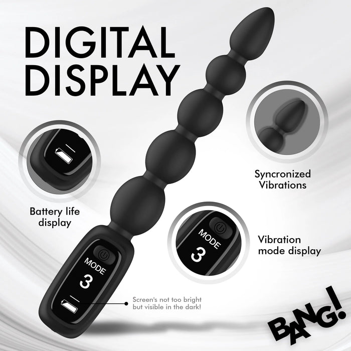 The Bang! Silicone Vibrating Anal Beads with Digital Display by XR Brands are showcased. This black sex toy features a digital display that shows battery life, synchronized vibrations, and vibration modes. Prominently displayed on the image are the texts "DIGITAL DISPLAY" and "BANG!". The anal beads offer a graduated size and various vibrating patterns against a subtle white and gray swirl background.