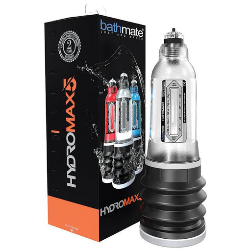 A boxed Bathmate Hydromax 5 Penis Pump - Clear is displayed beside the product. This device, featuring a cylindrical design with a black base and transparent upper section, comes in packaging adorned with bold typography and images of the pump in various colors, promising impressive size gains.