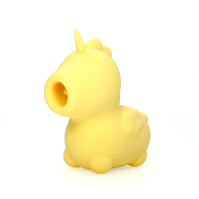 A charming yellow unicorn-inspired toy named the Bean Blossom Unicorn Shaped Licking Tongue Vibrator from Creative Conceptions, made of premium silicone. Featuring closed eyes, a small horn on its head, delicate wings on its back, and a hollow open mouth, it stands against a plain white background.