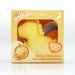 A yellow unicorn-shaped toy in a box featuring rainbow and star designs, labeled with "Unihorn" and "Bean Blossom Unicorn Shaped Licking Tongue Vibrator - Yellow" by Creative Conceptions. Experience the whimsical "Flirtatious Flutters of Fantasy" with this silicone unicorn vibe for magical moments.