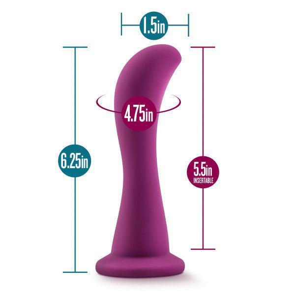 Image of the Bellatrix 6.25 Inch G-Spot and Prostate Dildo by Blush in Plum Purple, made from curved silicone and designed for prostate or g-spot stimulation. The dimensions are labeled: 6.25 inches in total height, 5.5 inches insertable height, 4.75 inches circumference, and 1.5 inches diameter at its widest point, featuring a wide base for stability.
