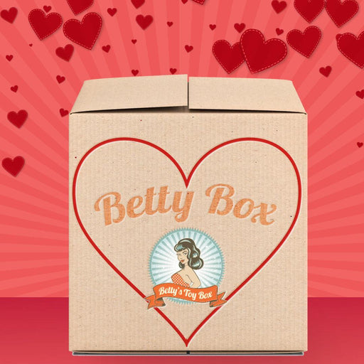 Betty's Cliterrific Mystery Box - Valentine's 2026 Edition features a retro woman on a red and pink box with hearts, “Betty’s Toy Box” logo, and “Betty Box”—a perfect surprise gift for Valentine’s Day!.
