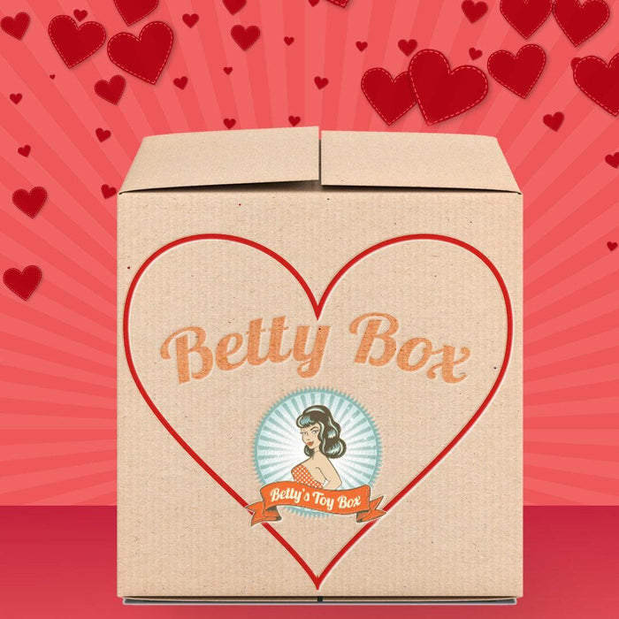 Betty's Cliterrific Mystery Box - Valentine's 2026 Edition features a retro woman on a red and pink box with hearts, “Betty’s Toy Box” logo, and “Betty Box”—a perfect surprise gift for Valentine’s Day!.