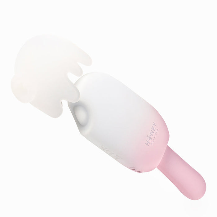The Bite Me Sucking Tapping & Vibrating Cream Pop Vibe, shaped like a melting ice cream bar with a white top and light pink handle, features a playful popsicle-inspired design and is photographed on a white background.