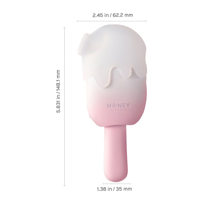 The Bite Me Sucking Tapping & Vibrating Cream Pop Vibe is a pink and white ice cream-shaped clitoral vibrator (5.83" x 2.45", handle 1.38") with "Honey Play Box" text—playful design meets pleasure, shown on a white background.
