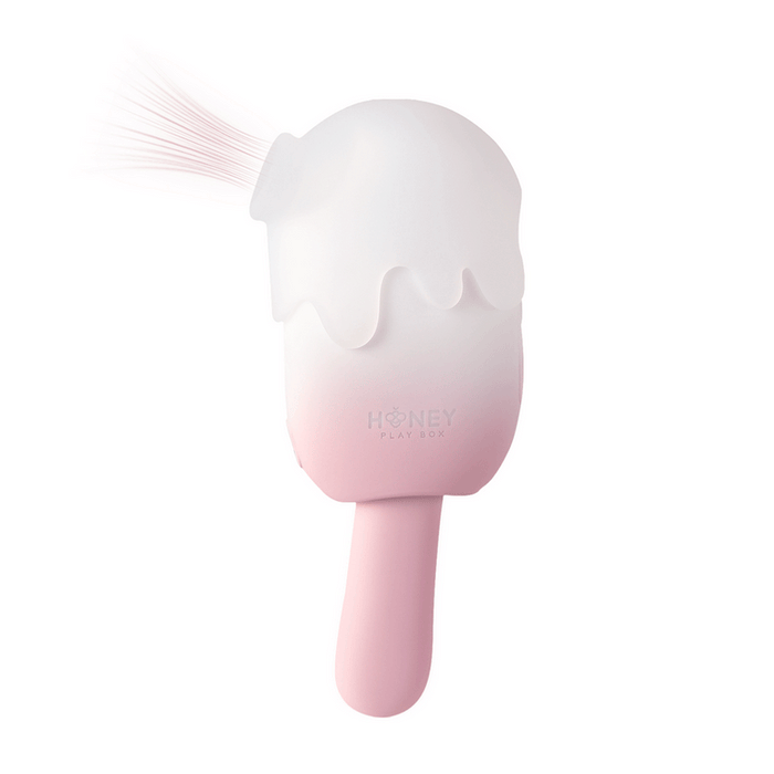 The Bite Me Sucking Tapping & Vibrating Cream Pop Vibe is a pink and white, ice cream-shaped clitoral vibrator with a soft, brush-like tip, frosted handle, melting detail, and playful waterproof design.