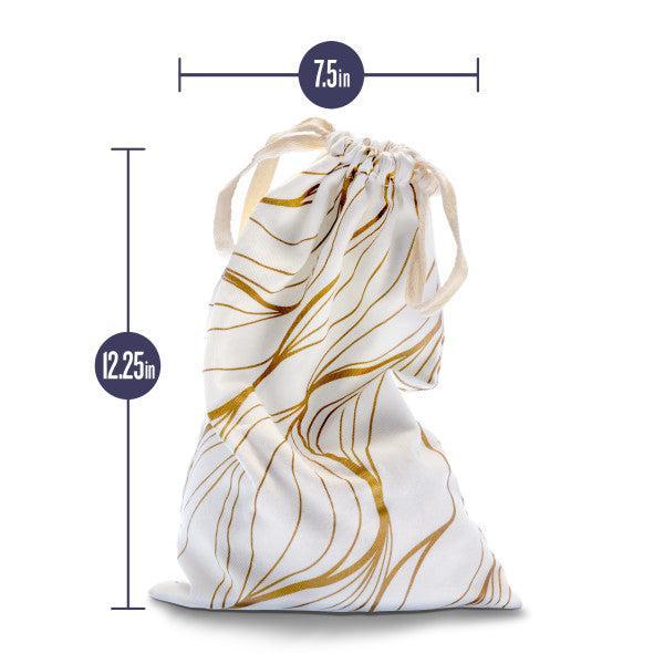 The Blush Embrace White & Gold Toy Storage Bag by Blush is a white cotton bag adorned with stylish gold leaf patterns and a convenient drawstring tie closure. Measuring 7.5 inches in width and 12.25 inches in height, it's perfect for discreetly storing your sex toys.