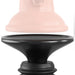 Close-up of a two-piece object, one part being a smooth, light pink featureless ring or cap with a globe logo, and the other part being a black, shaped base with ridged edges reminiscent of the Body Dock Thruster Powerful Thrusting Suction Cup Sex Toy Mount. The pieces are separated and aligned vertically facing each other.