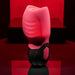 A cylindrical device, the Body Kisses Red Suction Masturbator and Vibrator by Evolved Novelties, is displayed against a red background. The textured pink top contrasts with the smooth black base, which features buttons, including one with a lipstick icon. The lighting accentuates its sleek design and highlights its 7 speeds for varied experiences.