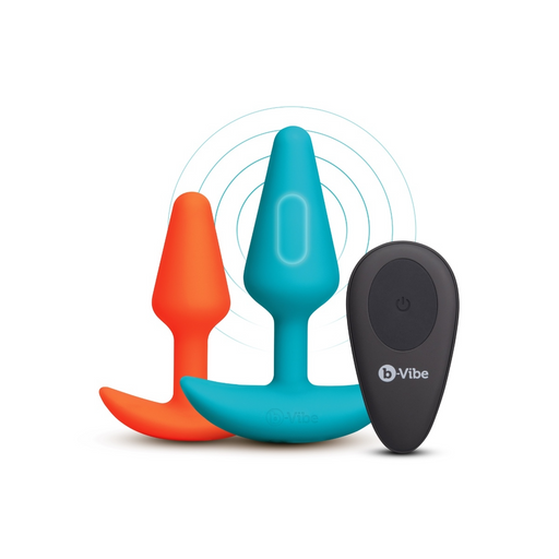 Orange and teal silicone anal plugs with a black remote control for vibration, set against a white background.