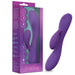 The Fever Dream Beginner G-Spot Rabbit Vibrator in purple silicone is shown beside its purple and teal packaging, which displays product info and the "Sexy Things" brand name in cursive at the bottom.