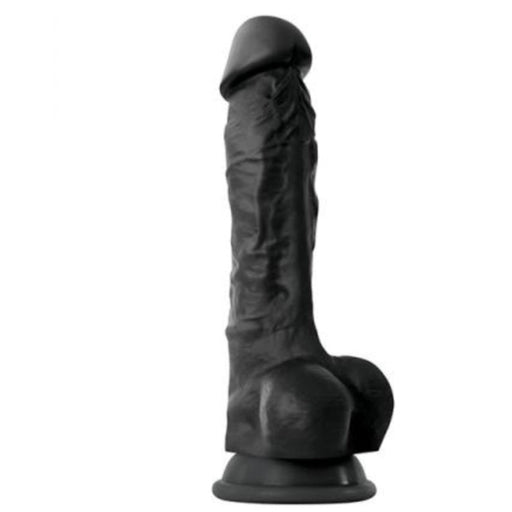 A girthy midnight black Colours Realistic 9 Inch Silicone Suction Cup Dildo - Black from NS Novelties with a pronounced head, textured veins, and testicles at the base. Made from superior grade silicone, its versatile suction cup base is designed for hands-free use. The toy stands upright against a white background.