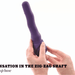 A person holds the Wiggle It Silicone Wiggling Vibrator with Suction Cup Base, which is purple and features a zig-zag shaped shaft. The bottom text partially reads, “SENSATION IN THE ZIG-ZAG SHAFT... up base.”.