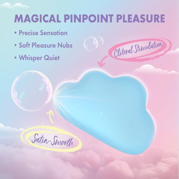 A pastel image features the Cuddle Cloud External Palm Sized Vibrator, a blue silicone toy labeled "Clitoral Stimulation" and "Satin-Smooth," with text: "Magical Pinpoint Pleasure," "Precise Sensation," and "Whisper Quiet." Bubbles and clouds surround it.
