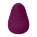 The Dame Pom Hand Held Flexible Vibrator in Plum is a small, pear-shaped device made from medical grade silicone, featuring a smooth surface and a single indented front button, shown against a white background.
