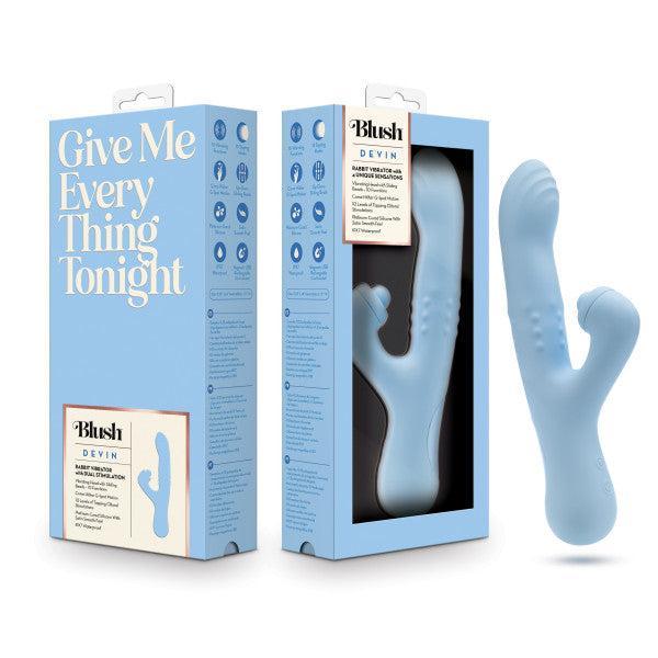 Blue Blush packaging featuring the Devin Clit Thumping G-Spot Rabbit with Shaft Rotation, a light blue, dual-ended personal massager. To the left, the package showcases white text saying "Give Me Everything Tonight" alongside product information. The massager promises dual stimulation, displayed enticingly next to the box.