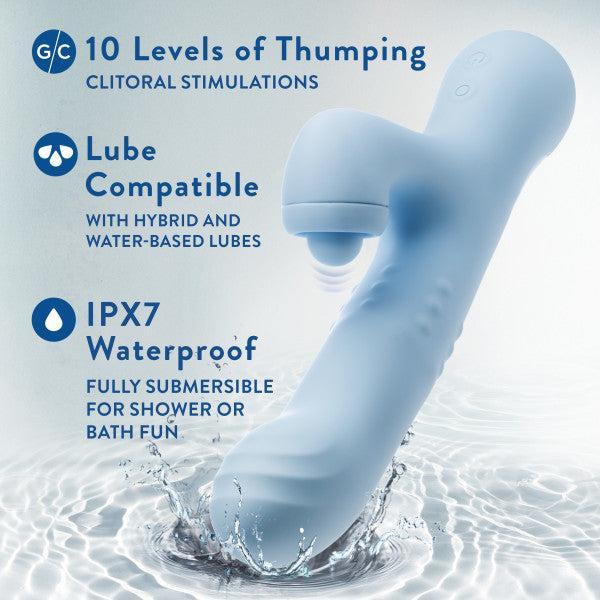 The Devin Clit Thumping G-Spot Rabbit with Shaft Rotation by Blush is a blue waterproof clitoral massager featuring 10 levels of dual stimulation. It is compatible with hybrid and water-based lubricants. With an IPX7 waterproof rating, the product image showcases its fully submersible capability, making it perfect for use in showers or baths.