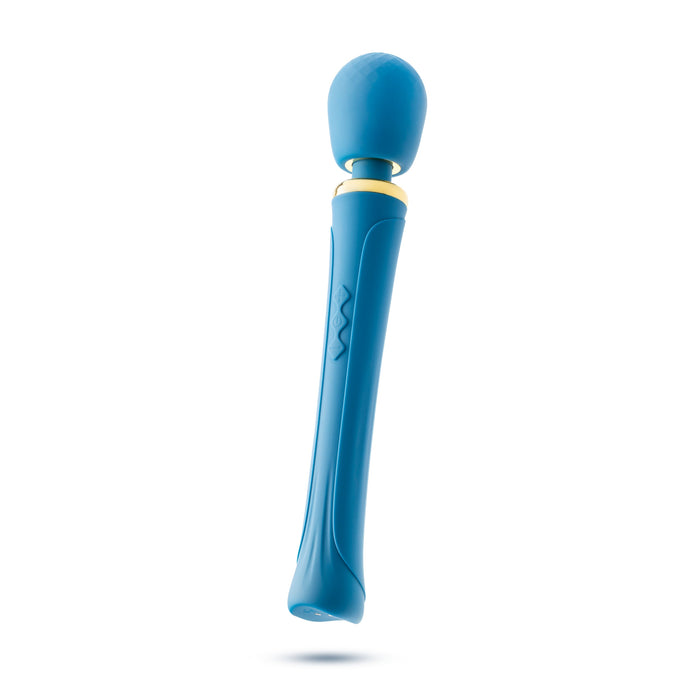 The Dianna Rechargeable Rumbly Waterproof Wand Vibrator from Blush is a luxurious blue handheld electric massager that features a rounded head and an ergonomic handle design. The handle includes textured grip sections, and a yellow band separates the head from the body. With 20 vibrating patterns and waterproof capabilities, this elegant wand stands upright against a white background.