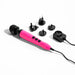 The Doxy Doxy Die Cast 3 Compact Wand Vibrator in Hot Pink, made from body-safe silicone and featuring a black head, comes with a matching black power adapter and multiple international plug attachments. This compact powerhouse includes buttons on the handle. The items are arranged on a plain white background.