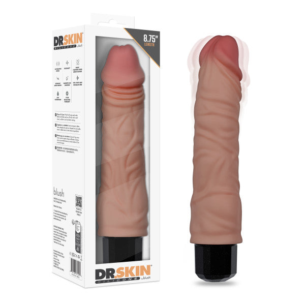 The Dr. Hunt 8.75 Inch Vibrating Silicone Dildo, in a lifelike flesh tone and penis shape, is shown next to its packaging, which highlights its size, vibrating features, and body-safe silicone material.