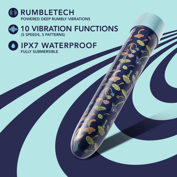 A blue floral pattern vibrator featuring various colors stands against a light blue background, with text on the left side listing its attributes: "RumbleTech powered deep rumbly vibrations, 10 vibration functions (5 speeds, 5 patterns), IPX7 waterproof and fully submersible, USB rechargeable." The product is the Dreamscape Powerful Extra Long Rechargeable Vibrator from Blush.