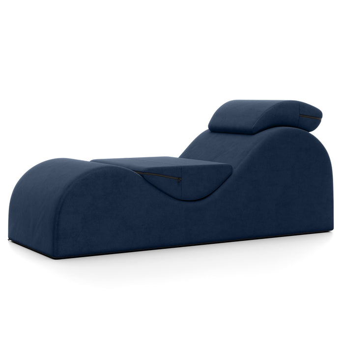 The Liberator Esse Sex Lounger is a modern, dark blue ergonomic lounger with a curved shape and attached headrest, designed for ultimate comfort and relaxation.