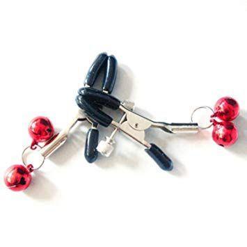 The Everything Bondage 9 Piece Beginner's Bondage Kit - Black, by Ple'sur, includes a silver metal adjustable nipple clamp with black rubber tips, ideal for a beginner's bondage set. This elegant clamp features small red bells on each side, attached via small rings that add both a decorative and audible element to the BDSM accessory. The clamp is showcased on a white background.