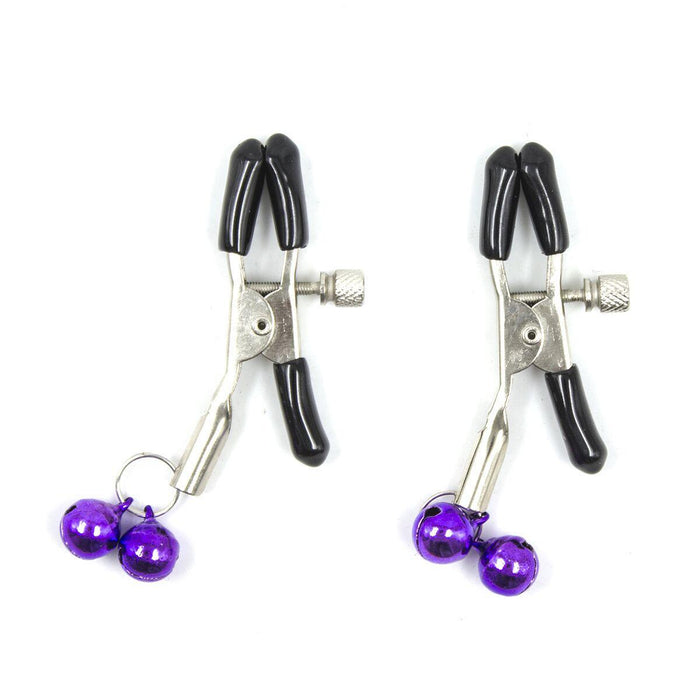 The Ple'sur Everything Bondage 9 Piece Beginner's Bondage Kit - Purple includes two metal clips with black rubber handles and adjustable screws. Each clip features two small purple bells at the bottom, designed to add a sensory thrill. The clips are displayed against a plain white background.