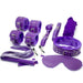 The Everything Bondage 9 Piece Beginner's Bondage Kit - Purple by Ple'sur includes padded handcuffs, ankle cuffs, a ball gag, a collar with a leash, a flogger and more. This collection of purple BDSM accessories is perfect for a starter set and all items in this sensory thrill kit are arranged on a white surface.