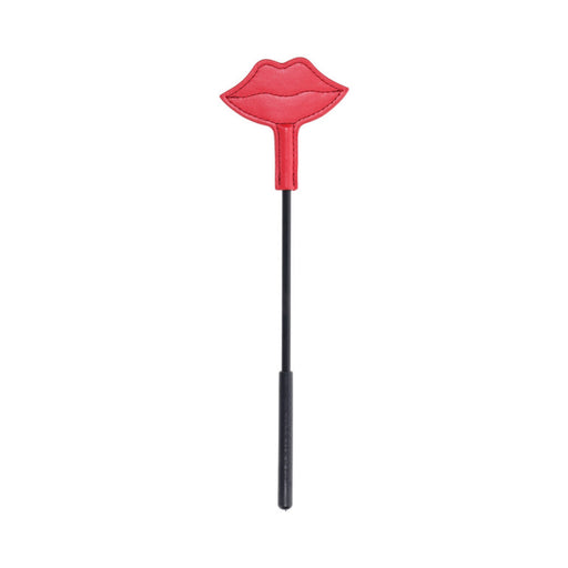 A playful red lips shape on a thin black stick from the Ex's & Oh's Kiss Kit - 4 Piece Beginner Bondage Kit, perfect as a novelty prop or fun accessory, isolated on a white background.