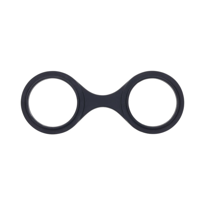 The Ex's & Oh's Kiss Kit – a 4-piece beginner bondage set – features a black, double-ring accessory with two circular openings connected by a short bridge, shown from above on a white background—a perfect starter for your collection.