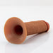 A chocolate-colored, textured silicone object, resembling the Fantasy X-Tensions Elite Hollow 7 Inch Silicone Dildo & Strap-On Harness from Pipedream Products, with a flared base and cylindrical shape, is shown on a plain white background.