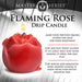 A red, rose-shaped candle called the Flaming Rose Drip Candle is shown lit. It's made from unscented wax, ideal for wax play, and designed to intensify erotic experiences with its low melting point.
