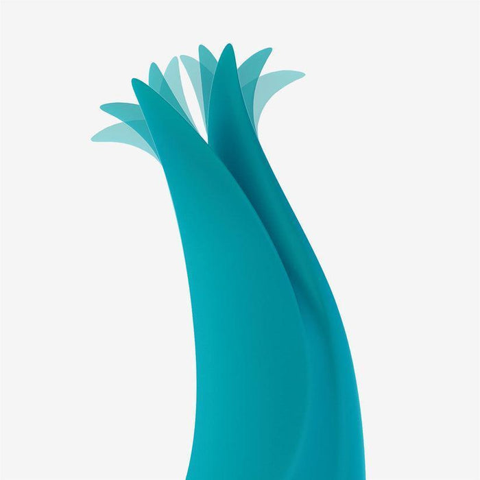 Abstract artwork showcasing smooth, elongated teal shapes with translucent, overlapping tips on a plain white background. These flowing forms resemble the elegance of the Fun Factory Volta Rechargeable External Vibrator in Petrol Blue and evoke a sense of movement and grace.