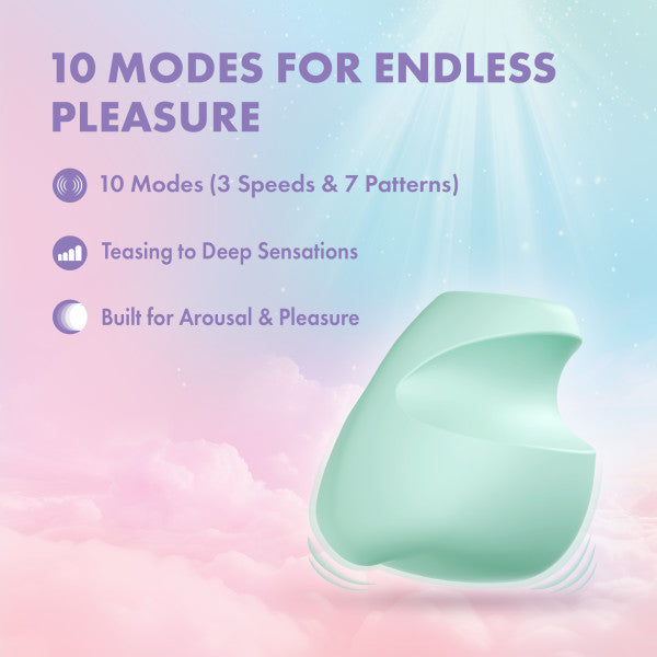 The Dream Crush Waterproof Ergonomic Finger Vibrator in mint green, shown on a pastel cloud background, offers 10 modes—3 speeds and 7 patterns—for teasing to deep sensations. Made from body-safe silicone.