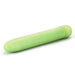 A Gaia Biodegradable, Recyclable Eco Vibrator - Green from Blush, featuring a smooth surface and light green cylindrical design, rounded on one end with a slightly recessed circular pattern on the other end, laying horizontally on a white background.