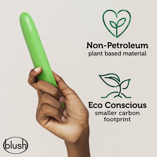 A hand holding a green object, next to text reading, "Non-Petroleum plant based material" with a heart-shaped leaf icon, and "Eco Conscious smaller carbon footprint" with a leaf icon. The brand name "Blush" is at the bottom left corner. This Gaia Biodegradable, Recyclable Eco Vibrator - Green ensures sustainability in every intimate moment.