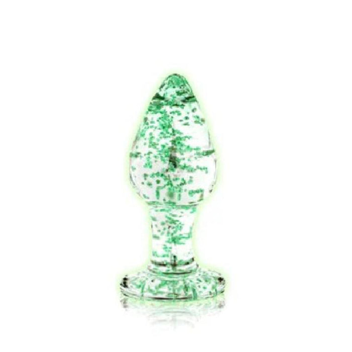 A Glow in the Dark Glass Anal Plug - Small from Shots displayed upright on a clear glass stand against a white background.