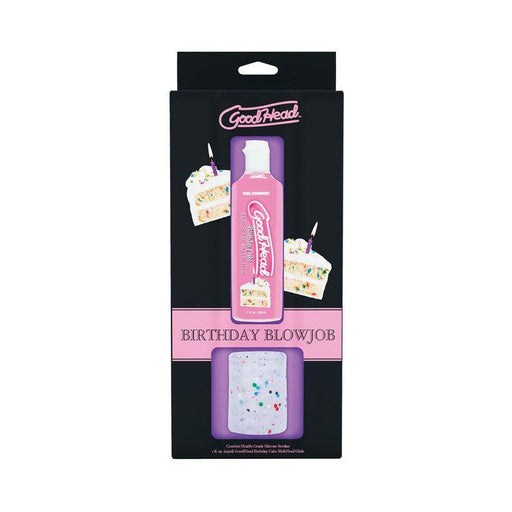 A black box containing a pink bottle of oral gel is prominently displayed with the label "GoodHead." The packaging by Doc Johnson is adorned with illustrations of birthday cake slices topped with lit candles, and features the text "GoodHead Birthday Blowjob Kit - Stroker + Birthday Cake Slick Head Glide" at the bottom, promising a celebration that's both enjoyable and flavorful.