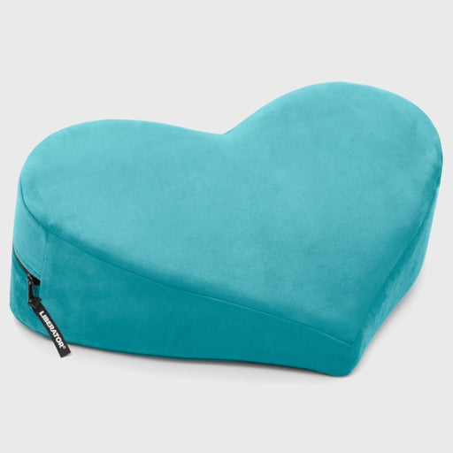 The Liberator Heart Wedge Sex Positioning Cushion in teal blue features a heart-shaped design, smooth fabric, and visible zipper—ideal as stylish sex furniture for relaxing comfort on any surface.