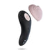 A Blush Heartbeat Panty Vibrator with Remote Control, featuring a black curved design, a smooth finish, and two small buttons, crafted from hypoallergenic silicone, is shown next to its pink heart-shaped attachment. Both items float elegantly against a white background.